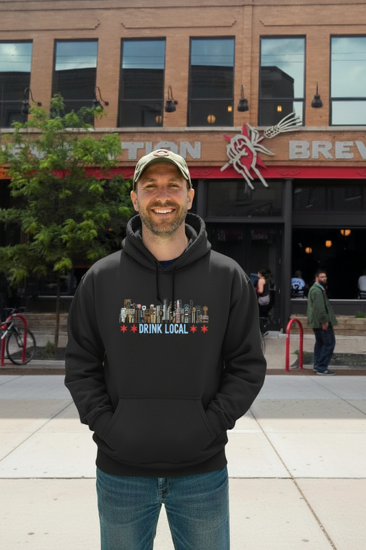 Man in Drink Local hoodie on sidewalk at brewery